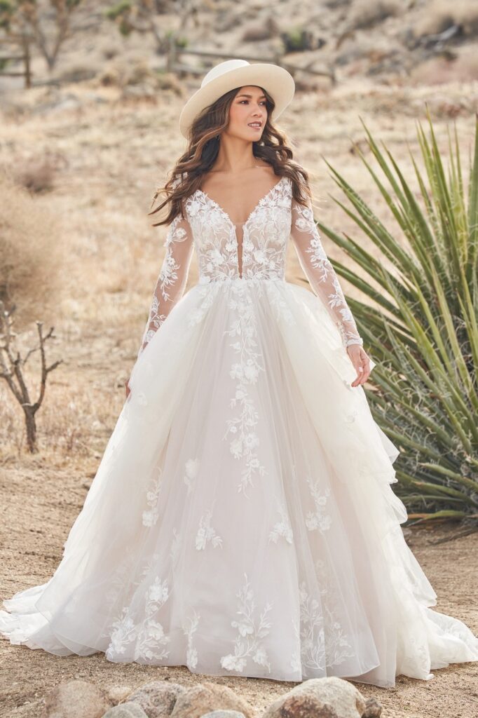 66269-Lillian West-PureBridal-lace sleeves, tiered skirt, plunge neckline. wedding dress, edmonton wedding dress, edmonton bridal shop