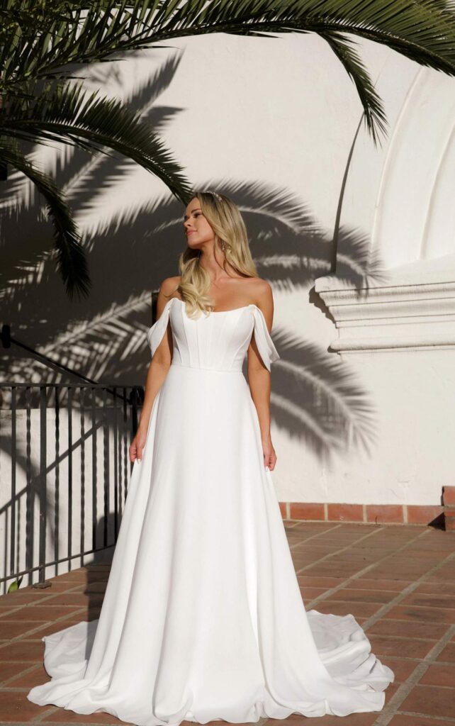 7618-Stella York-Pure Bridal-Edmonton wedding dress, Edmonton bridal shop-Aline crepe dress, swoop neckline, off the shoulders straps