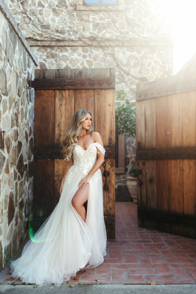 7740-Stella York-Essense of Australia-Pure Bridal-Lacy-Sexy-Modern-wedding dress stores edmonton-Wedding gown-Dreamy-Boho-off the shoulders sleeves-slit-corset